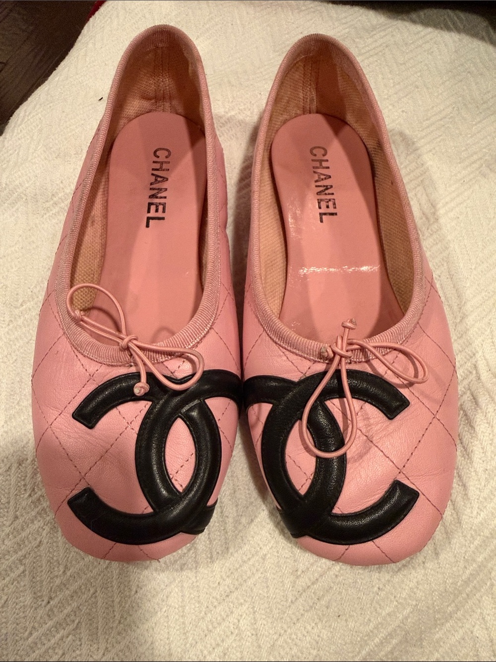 CHANEL Pink Quilted Leather Ballet Flats with Black CC Emblem